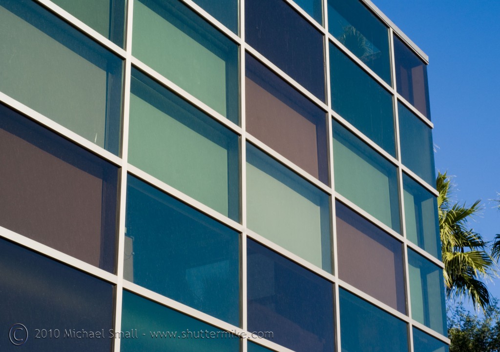 Photo of a green glass facade building