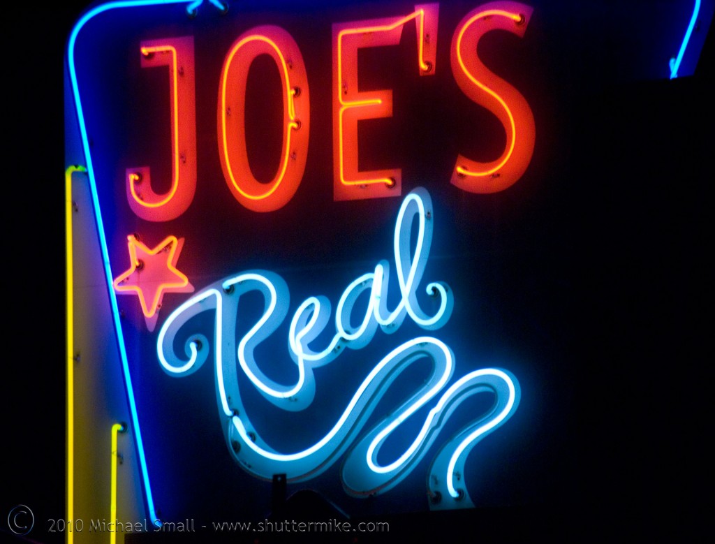 Photo of a neon sign for Joe's Real BBQ