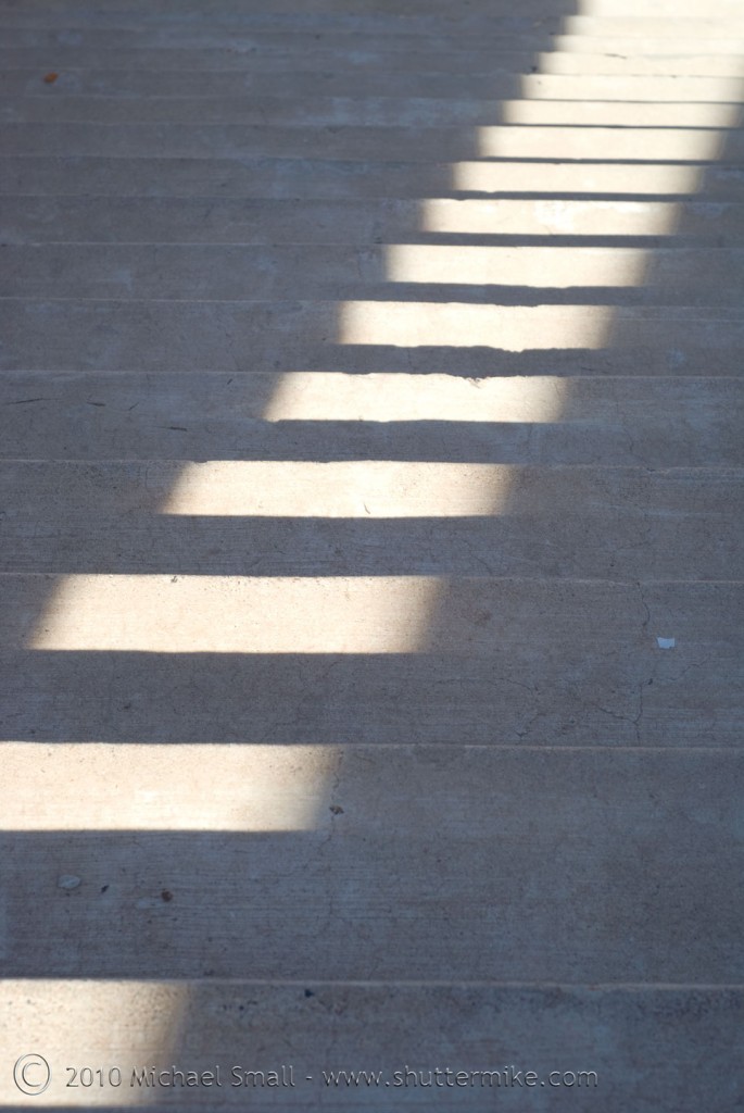 Photo of light and shadow on a conrete staircase