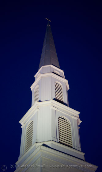 Photo of a white church steeple