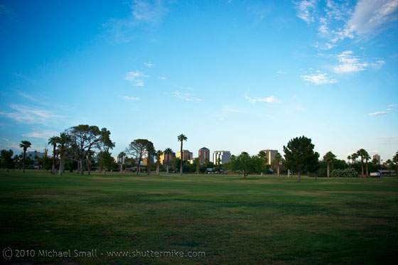 Photo of the Encanto golf course with city skyline in the background