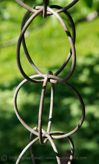 Photo of chain links with a shallow depth of field