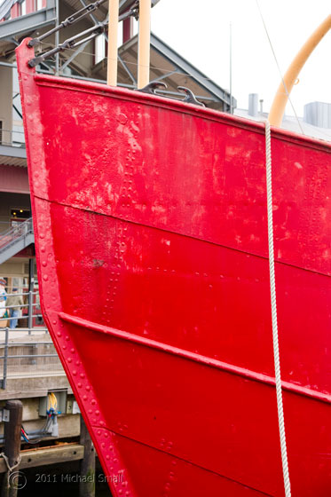 Photo of a red boat in New York Harbor