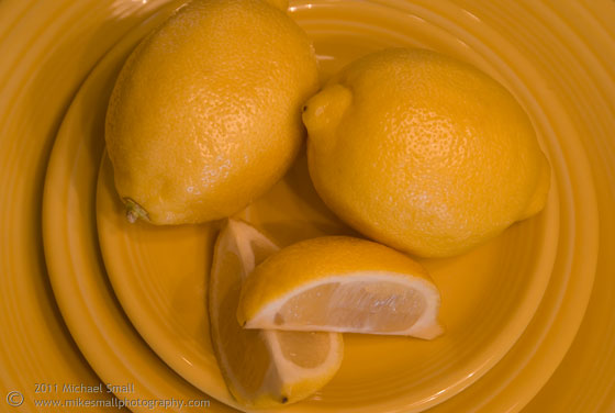 Still life photo of yellow lemons