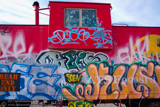 Photo of a grafitti tagged caboose