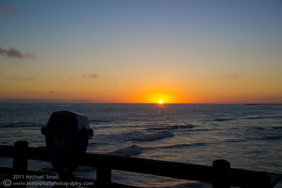 Photo of the sunset over the Pacific seen from the Ocean Beach pier