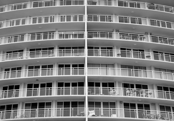Architectural photograph of teh balconies of a high rise condo building in Florida