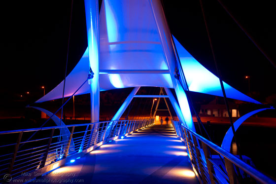 Photograph of the Tempe Town Lake Pedestrian Bridge Lit Up at Night